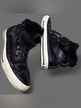 Black leather Converse high top trainers with faux fur lining